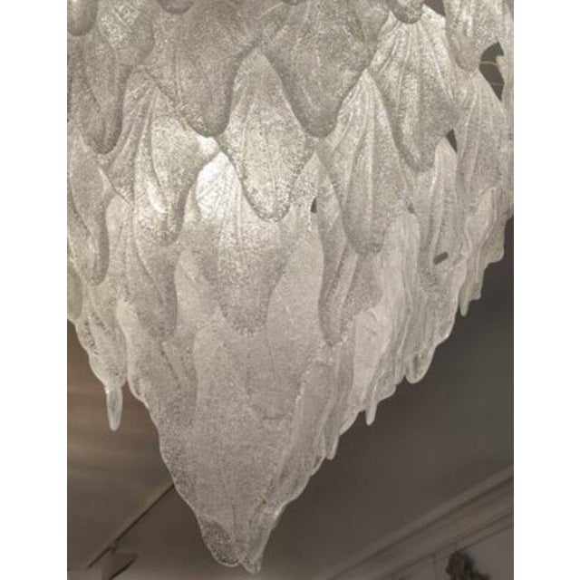 Murano Glass Ceiling Light This light features a spectacular cascade of numerous frosted, clear Murano glass leaves in a...