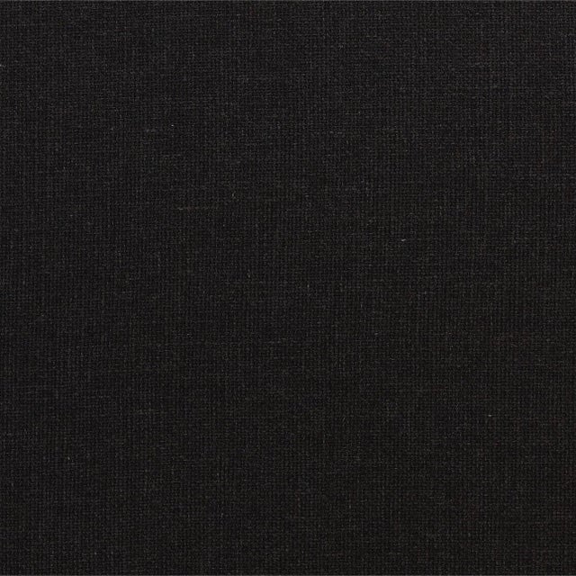 Modern dark charcoal polyester upholstered sofa. Simple rounded shape with matching two accent pillows included. Seat...