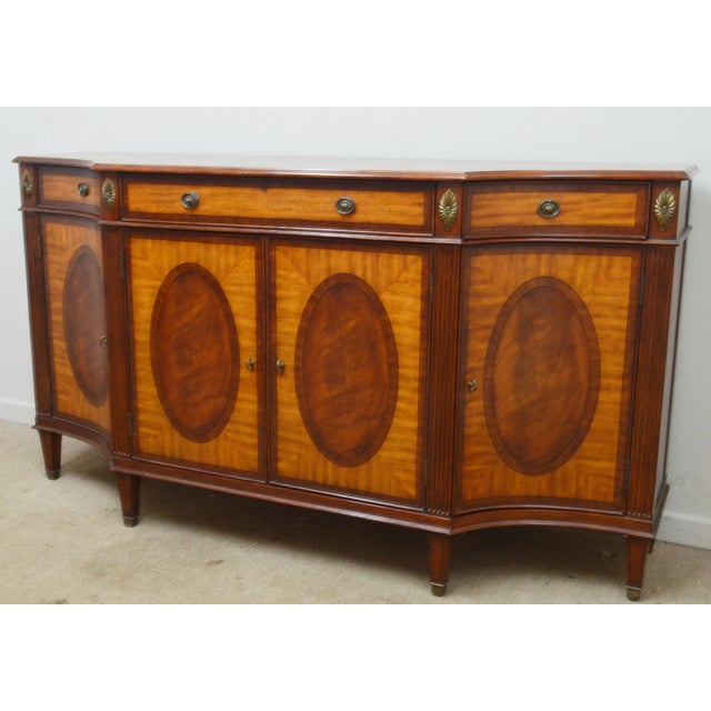 Inlaid Sideboard by Ethan Allen. Store item #566. It features banded top, three drawers and storage area.