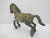 Small vintage bronze replica of a Han Dynasty galloping Horse figure featuring a green patina. Excellent condition. Very...