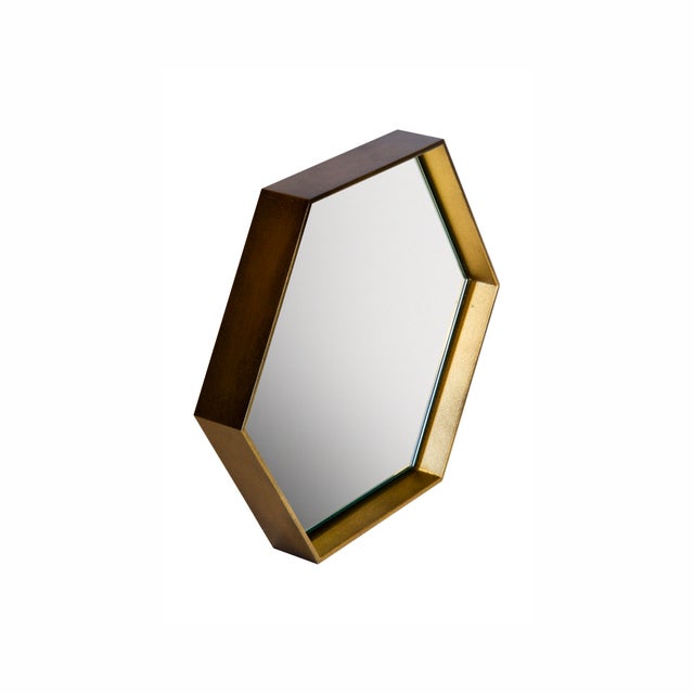 Cassiopeia is a modular system of hexagonal metal wall mirrors made in Italy. The steel frames are hand-crafted and...
