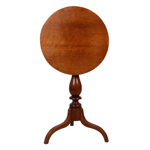 Vintage maple tilt top table, circa 1940. This American tilt top table has a pedestal base. Dimensions 23.75″H X 19.75″W X...