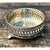 This vintage silver plate wine coaster showcases refined pierced-work craftsmanship, its cylindrical gallery form...
