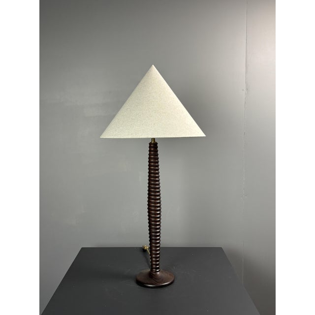 Pair midcentury French wood turned table lamp, in the style of Charles Dudouyt. Although generally attributed to the 50s -...