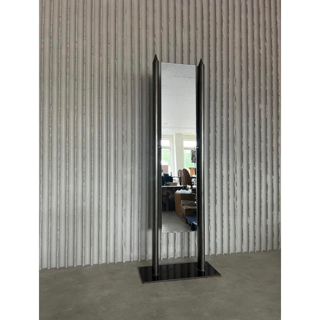Designer unknown italy, 1980s h 181 w base 63cm d base 28 a striking blend of art and function, this floor mirror with a...