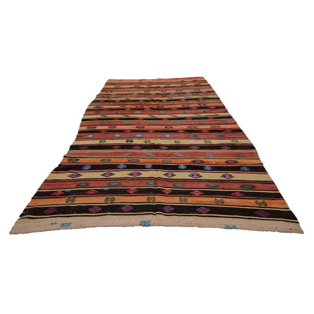 Vintage handwoven kilim rug from Denizli region of Turkey. Approximately 50-60 years old. In very good condition.