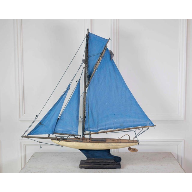 Built in Southport, England, in the twentieth century, this pond yacht named 'Old Star' is constructed in wood with tin...