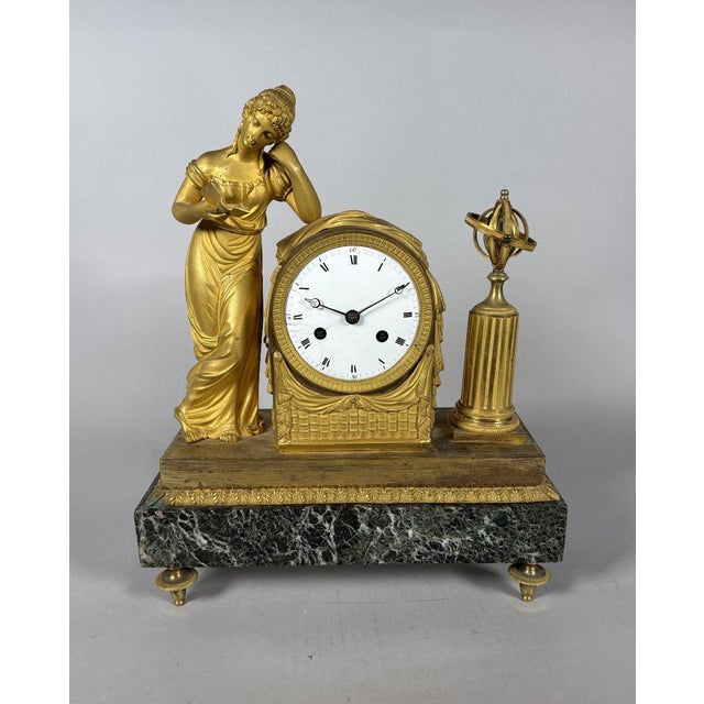 Empire period clock, Allegory of Knowledge, 19th Century For Sale