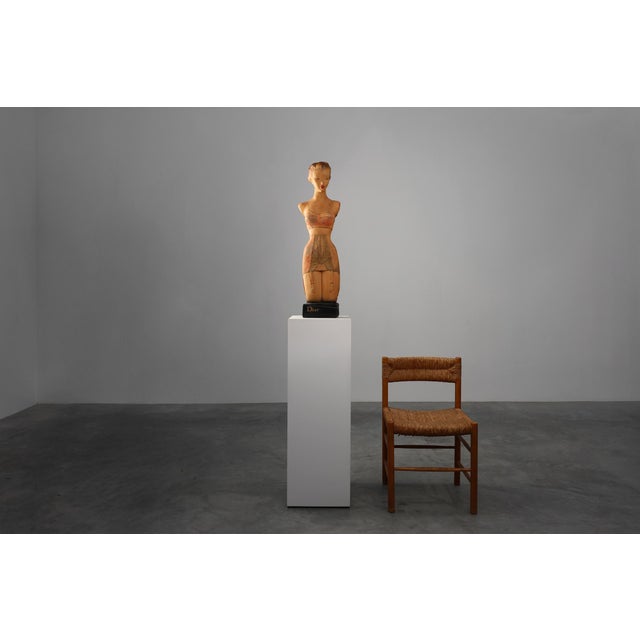 A rare and evocative piece of early 20th‑century fashion history, this signed plaster advertising statue by Novita was...