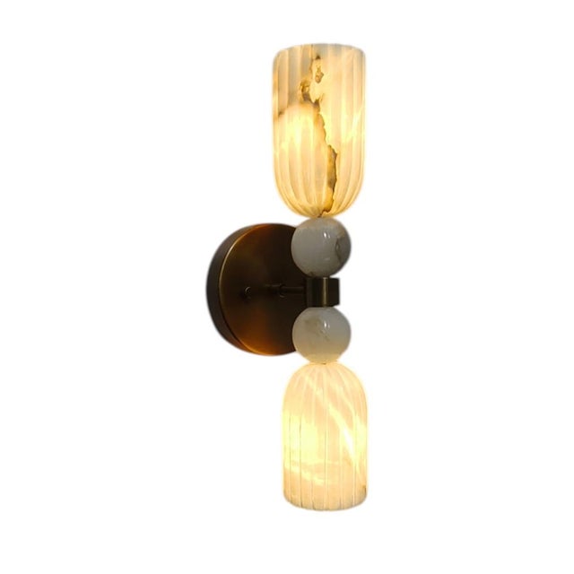 Product Description: Enhance your interior décor with this elegant Handcrafted Double Alabaster Wall Sconce, a perfect...