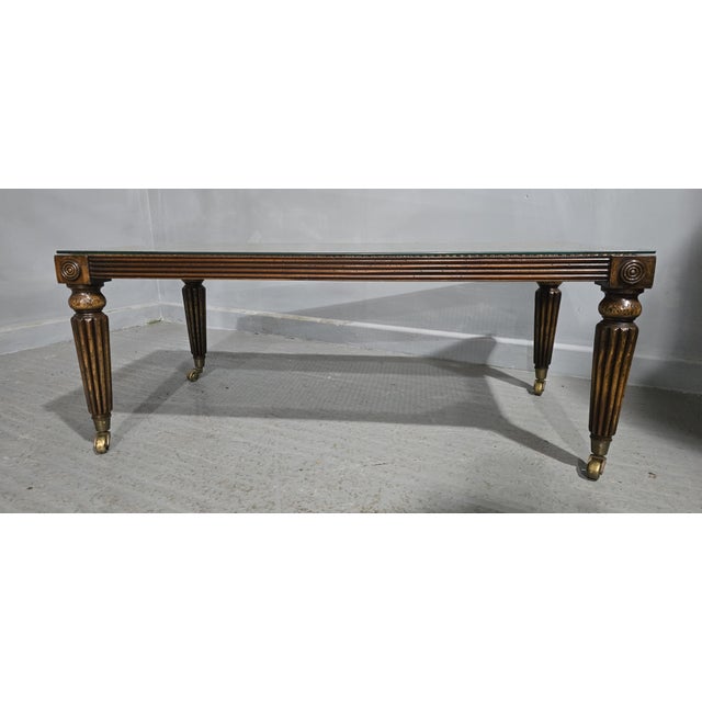 A super Regency style mahogany coffee table, reeded legs with brass cup castors, reeded frieze, and excellent quality...