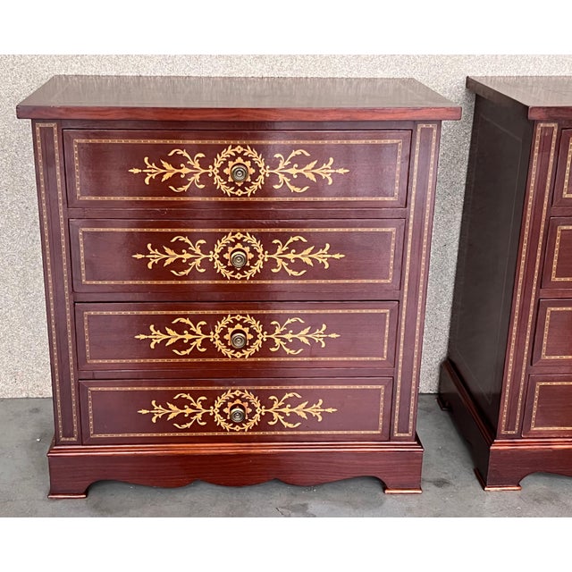 20th Century pair of Catalan, Spanish nightstands with four marquetry drawers and bronze hardware.