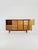 The high-quality highboard was produced by the manufacturer Omnia in the 1960s. The furniture was designed in terms of...