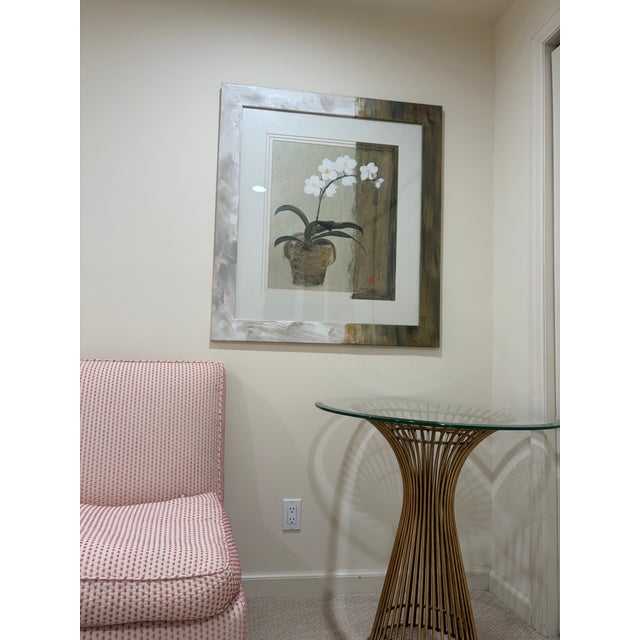 Very unique side table perfect for any space with a modern influence. Radiating metal rod base with hourglass pedestal...