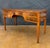 Elegant Georgian Revival writing desk crafted in hardwood, dating to the mid-20th century. The desk features a refined...