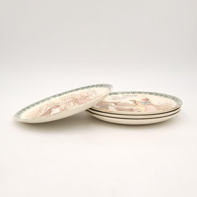 A set of four French faïence plates, circa 1900.