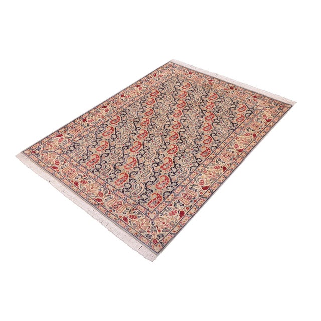 Designed with mesmerizing intricacy and gorgeous color palette, this hand-knotted masterpiece demonstrates the beauty and...