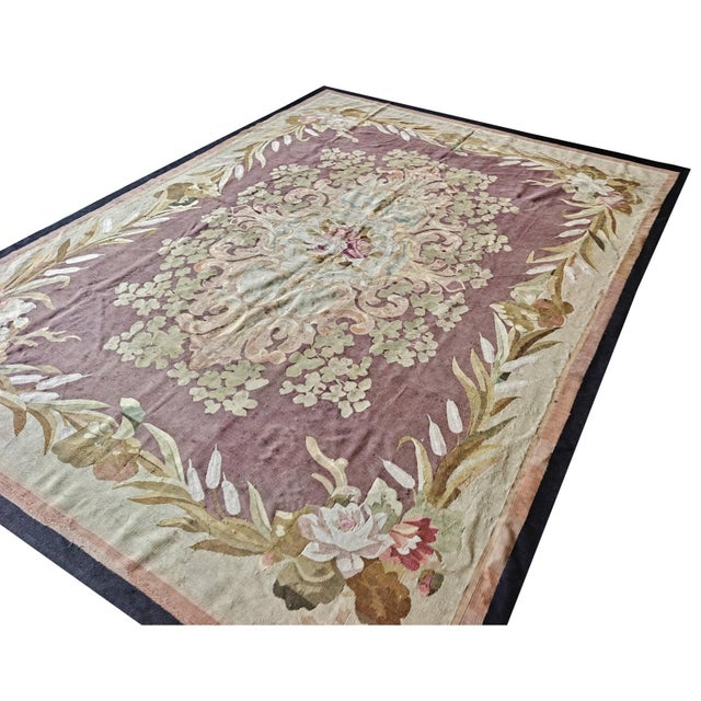 This is a breathtaking and highly authentic antique European Aubusson carpet, . Handcrafted in France utilizing...