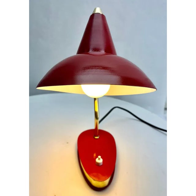 Classic compact design, this adjustable spotlight desk lamp Italy 1950's The Stand is metal and the flexible arm Brass The...