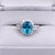Modern 6Ct Blue Zircon Ring With Natural Diamond Accents: Solid 14k Gold, Oval 11x8mm, Size 6.75 For Sale - Image 3 of 9