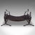 This is an antique Dragon motif fireplace set. An English, estate-made cast and wrought iron fire basket and andirons...