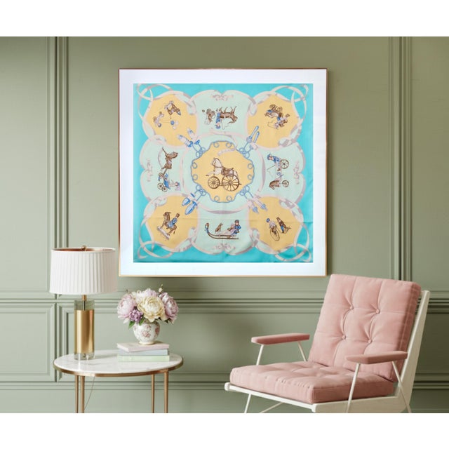 This is an authentic and professionally framed Hermès silk scarf called "Les Jouets Mobiles" from 1984, a very rare piece....