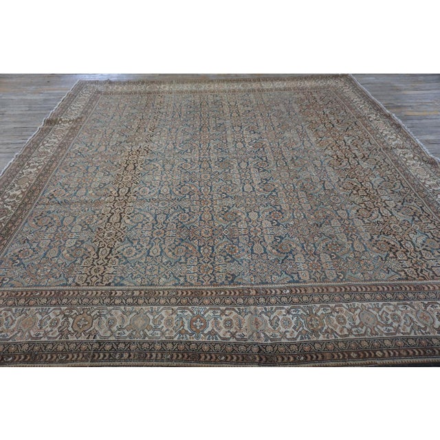 An exquisite and uniquely proportioned Antique Persian Malayer rug, circa 1880. Measuring 8' 8" x 8' 11", this piece is...