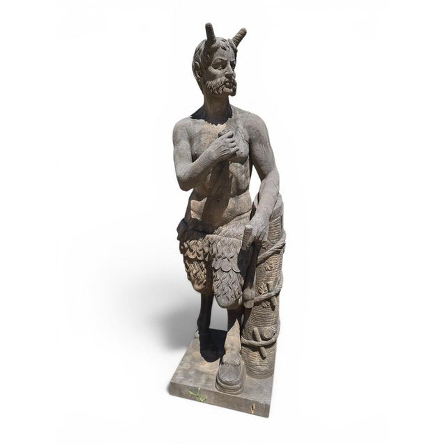 Impressive monumental stone sculpture depicting a faun, masterfully carved by the Neapolitan School in the early 20th...