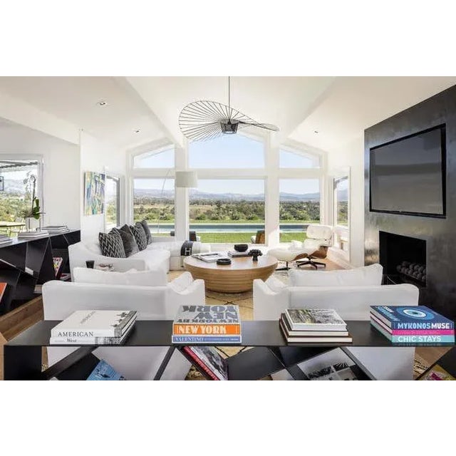 The iconic tribal Jaya drum table is handcrafted with traditional joinery, fabricated with multiple stacked discs in...