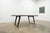 The Yukon Dining Table by Crate & Barrel combines natural wood character with a modern industrial silhouette. Crafted from...
