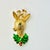 A lovely Christmas Brooch from Gerry’s Creatives from the 1970s. It features a lovely gold tone Reindeer Bust with two...