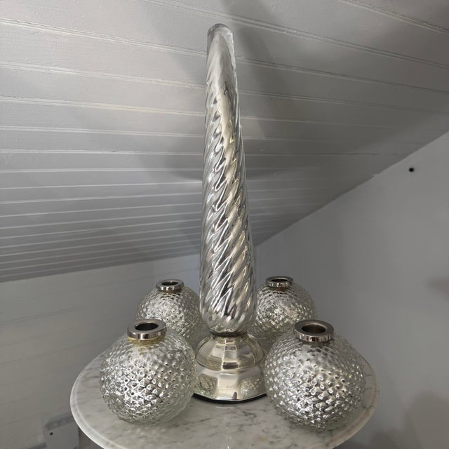 Brighten your mantel, sideboard, or holiday tablescape with this striking, curated five-piece collection of silver mercury...