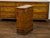 An Italian petite walnut commode from the early 19th century, with butterfly veneer and five drawers. Created in Italy...