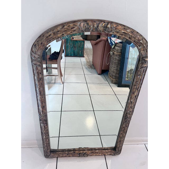 An elegant vintage La Barge wall mirror featuring a beautifully proportioned gilt frame surrounding a high-quality beveled...