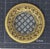 This plate is a beautiful accent or display piece. It has a intricately cut center surrounded by heavy gilding and a...
