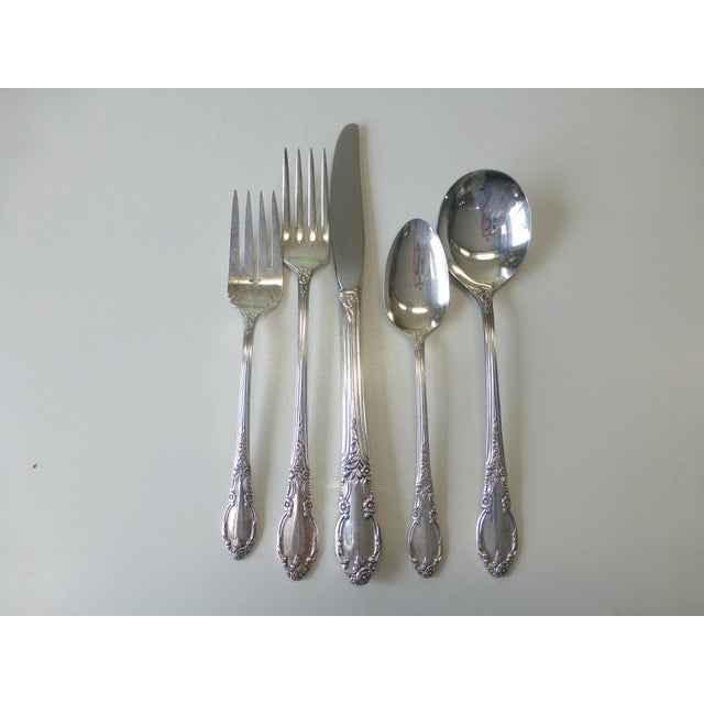 This is a beautiful 1952 vintage 1881 Rogers "Enchantment" pattern silver plate flatware set. No monograms 5 piece place...