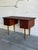 This handsome home office solution presents a classic asymmetrical layout featuring a single pedestal block of three deep...