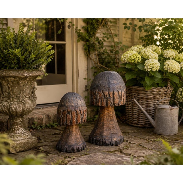 Wonderfully sculptural and full of character, this pair of vintage hand-carved oak mushroom statues celebrates the beauty...
