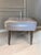 Add a perfect touch of authentic retro charm to your living space with this classic Mid-Century Modern square ottoman...