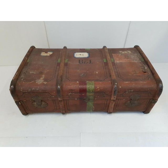 Fair condition. Significant signs of use, a tear in the canvas at the back. Wear on the removable interior compartment....