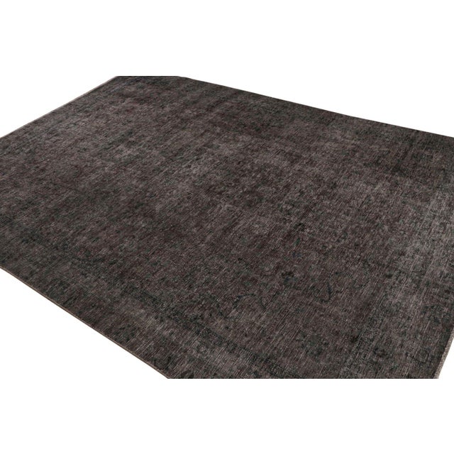 From our new collection of overdyed rugs, a 8×11 vintage Persian rug, hand-knotted in wool circa 1970-1980. On the Design:...