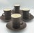 The Dansk Fluted Flamestone Brown cup and saucer is an iconic mid-century modern set designed by Jens Harald Quistgaard...