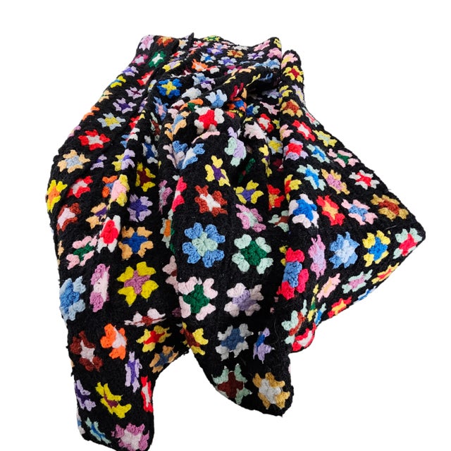 This vintage hand crocheted lap blanket is designed in a stunning combination of multicolor granny squares it is at once...