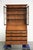 This antique English bookcase/secretary dates from the 18th century and is made of oak. The secretary consists of two...