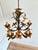 Vintage Italian five-light chandelier in hand-painted polychrome tole, dating to approximately the 1940s-50s. The...