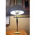 Rare opportunity to buy a Gerald Thurston wishbone lamp with the Laurel shade. The Thurston Wishbone lamp has become an...