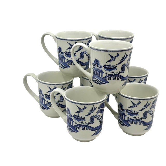 Set of 8 blue Willow made in England mugs. These are Johnson brother mugs. Like new conditon. Made in England marked...