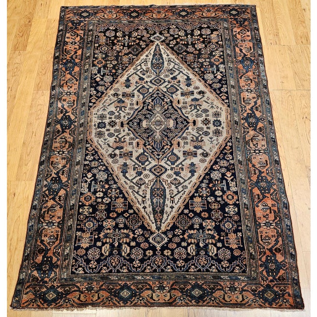 An elegant early 20th century Persian Malayer area rug from Northwest Persia, featuring the classic oversized Malayer...