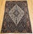 An elegant early 20th century Persian Malayer area rug from Northwest Persia, featuring the classic oversized Malayer...