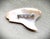 This vintage carved Natural Mother of Pearl Shell WWII Military Captain's Hat Brooch Pin dates from the 1940's war era...